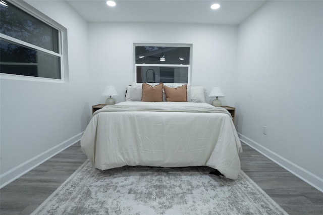 bedroom with wood-type flooring