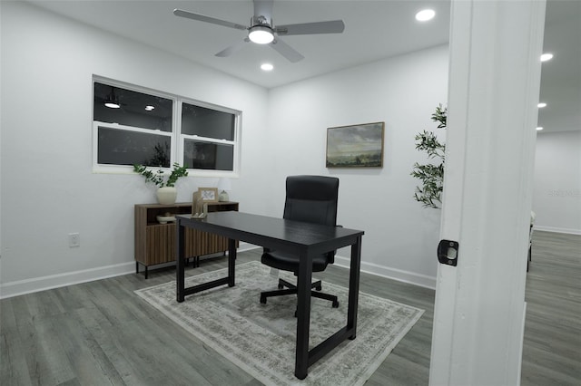 office with hardwood / wood-style flooring and ceiling fan