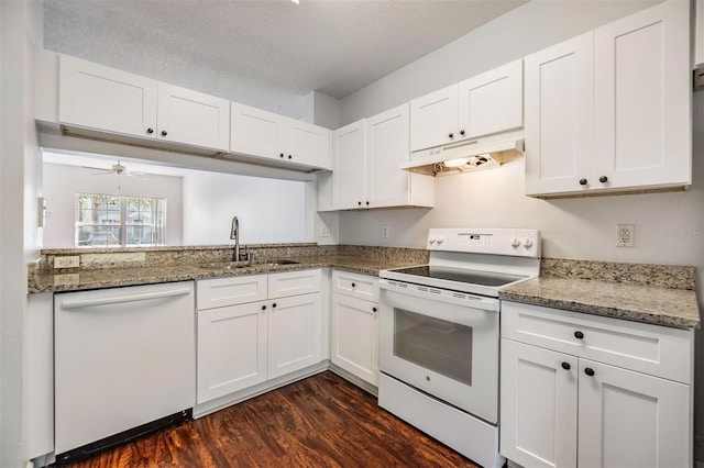 kitchen featuring white cabinets, dark hardwood / wood-style floors, white appliances, and sink