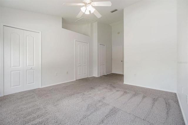 spare room featuring carpet flooring and ceiling fan