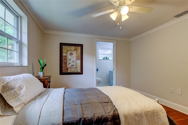 bedroom with wood-type flooring, connected bathroom, ceiling fan, and ornamental molding