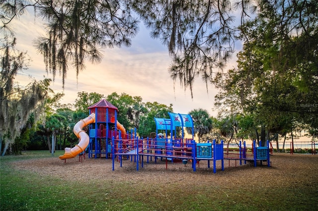 playground at dusk with a yard