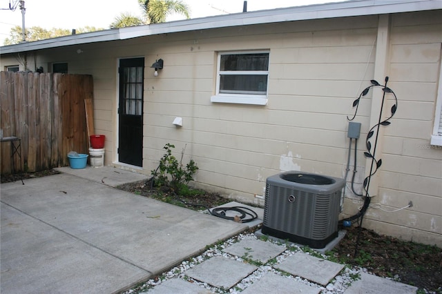 3402 W Obispo St, Tampa, FL 33629 - entrance to property with central air condition unit and a patio