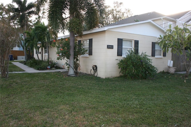 3402 W Obispo St, Tampa, FL 33629 - view of property exterior with a lawn