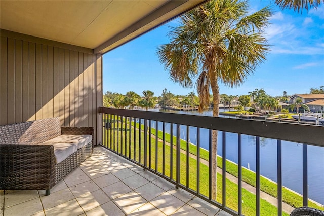 balcony featuring a water view