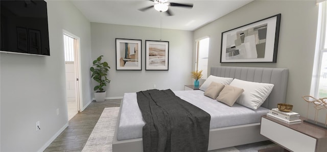 bedroom with multiple windows, ceiling fan, and wood-type flooring