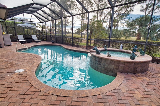 view of pool featuring an in ground hot tub, a lanai, and a patio