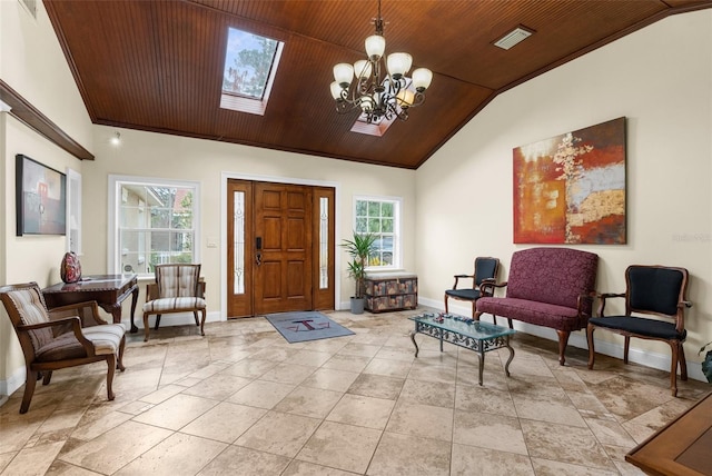 entrance foyer featuring crown molding, wood ceiling, lofted ceiling, and an inviting chandelier