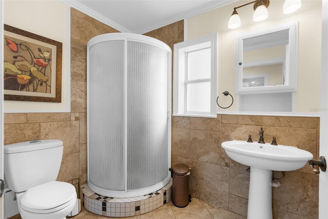 bathroom featuring walk in shower, tile patterned floors, crown molding, toilet, and tile walls