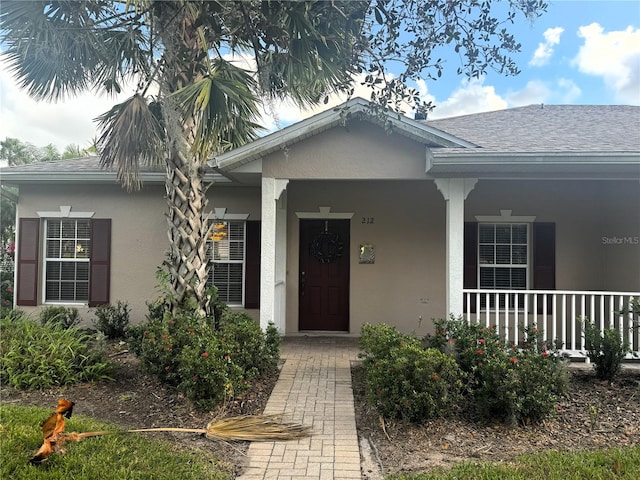 view of front of home featuring covered porch