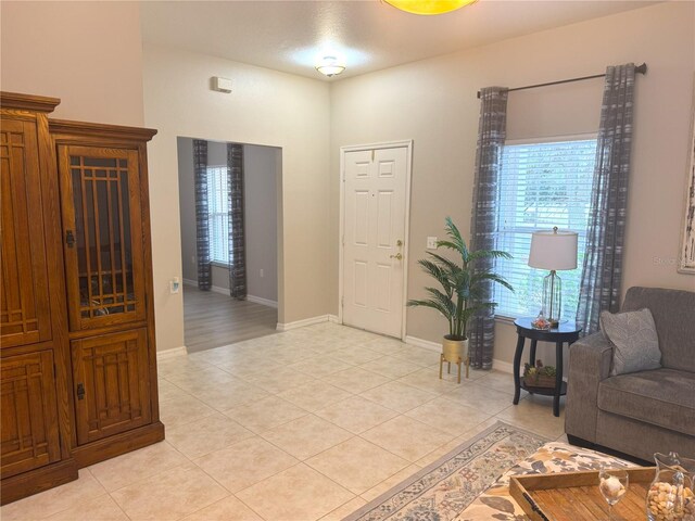 entryway featuring light tile patterned floors