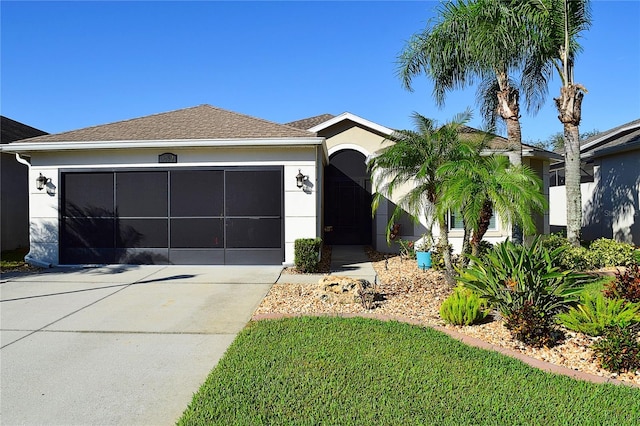 view of front of property featuring a garage