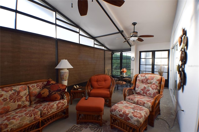 sunroom / solarium featuring ceiling fan and lofted ceiling