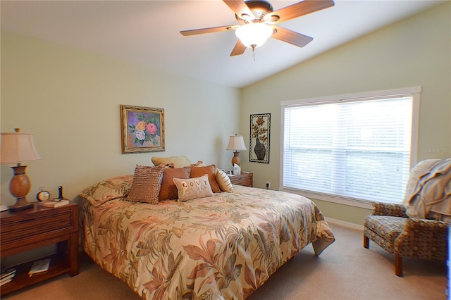 carpeted bedroom featuring ceiling fan and lofted ceiling