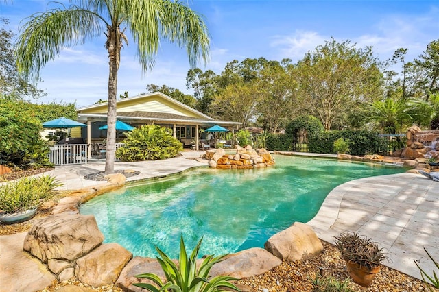 view of pool featuring a patio area