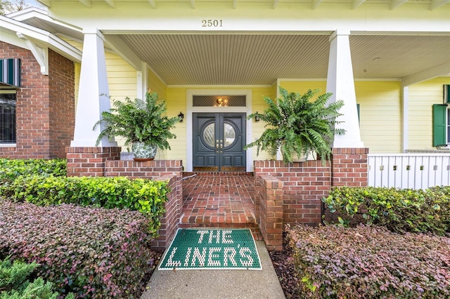 entrance to property with a porch