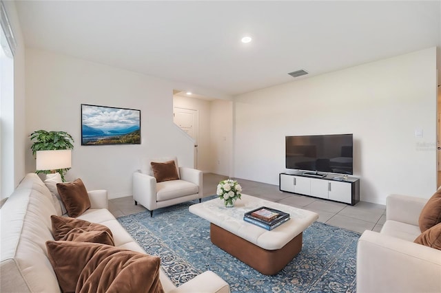 living room with light tile patterned floors