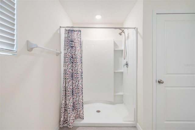 bathroom with curtained shower