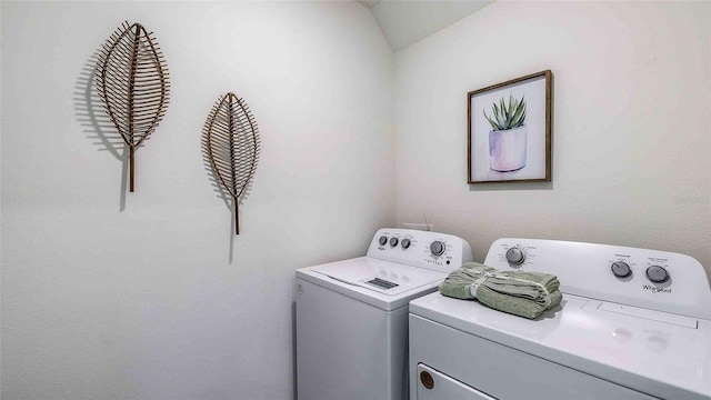 laundry area with independent washer and dryer