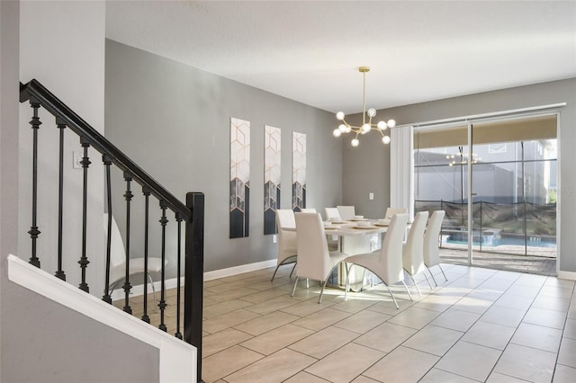 dining space with a chandelier