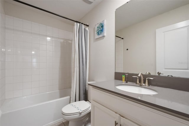 full bathroom with tile patterned flooring, shower / tub combo with curtain, vanity, and toilet