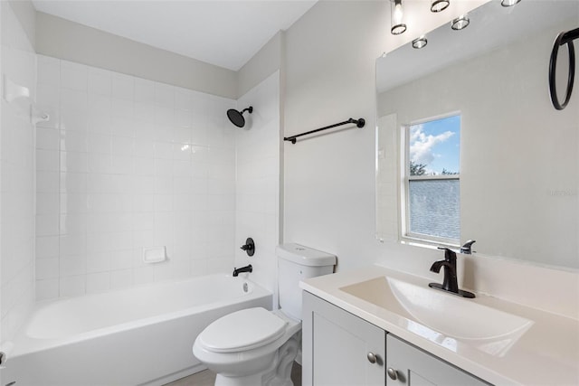 bathroom with toilet, bathtub / shower combination, and vanity