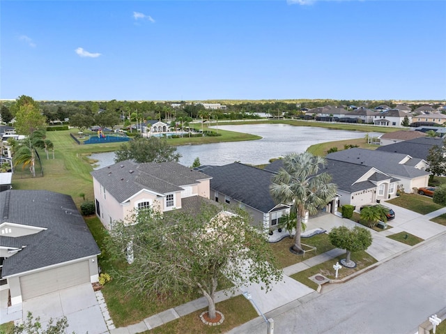 aerial view featuring a residential view and a water view