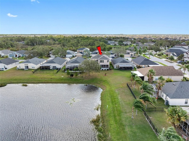 aerial view featuring a water view and a residential view