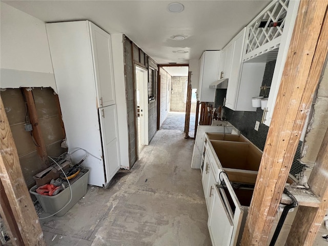 kitchen featuring white cabinetry