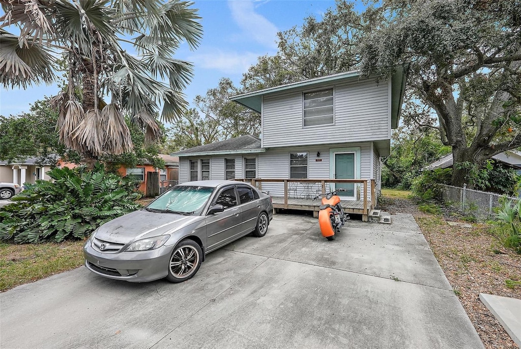 view of front of property with a wooden deck