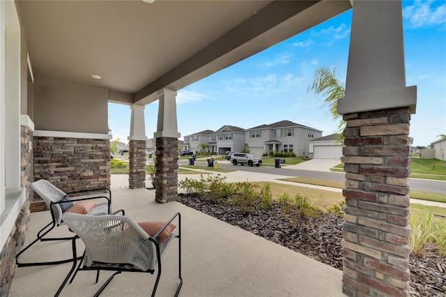 view of patio featuring a porch