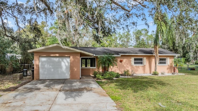 single story home featuring a garage, fence, concrete driveway, and a front yard