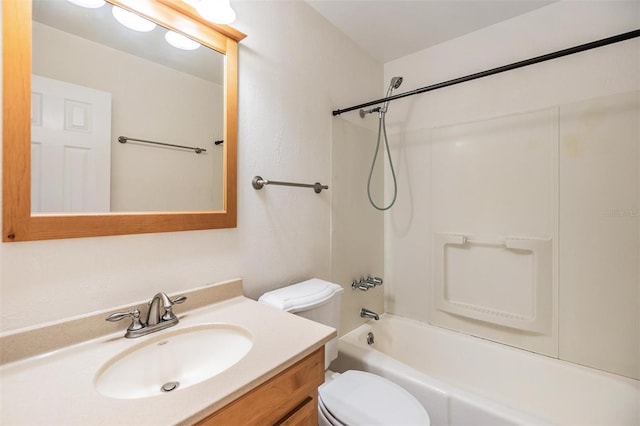 full bathroom with vanity, shower / bathtub combination, and toilet