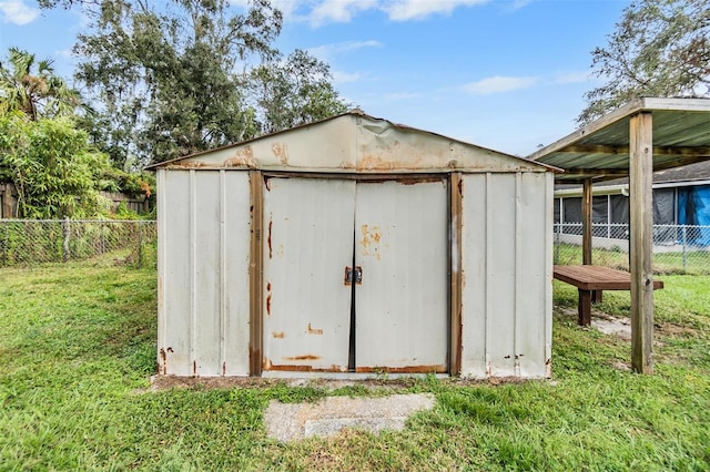 view of outdoor structure with a yard