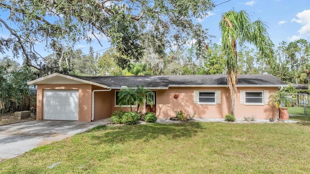 ranch-style house with a front lawn and a garage