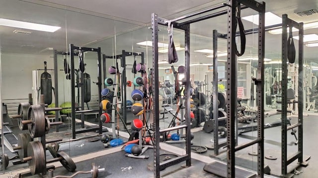 exercise room featuring visible vents