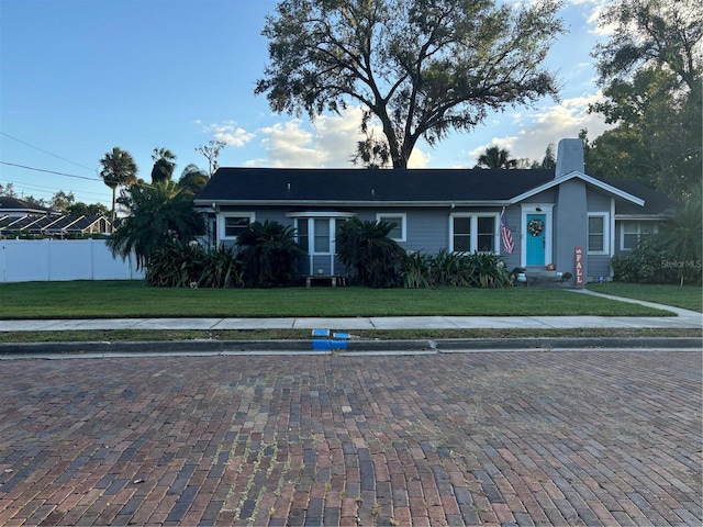 view of front of house with a front lawn