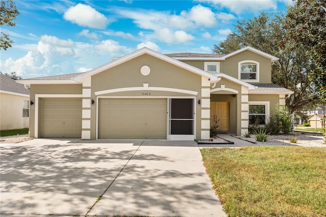 view of front of home with a garage