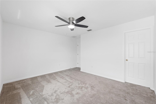 unfurnished room with carpet floors and ceiling fan