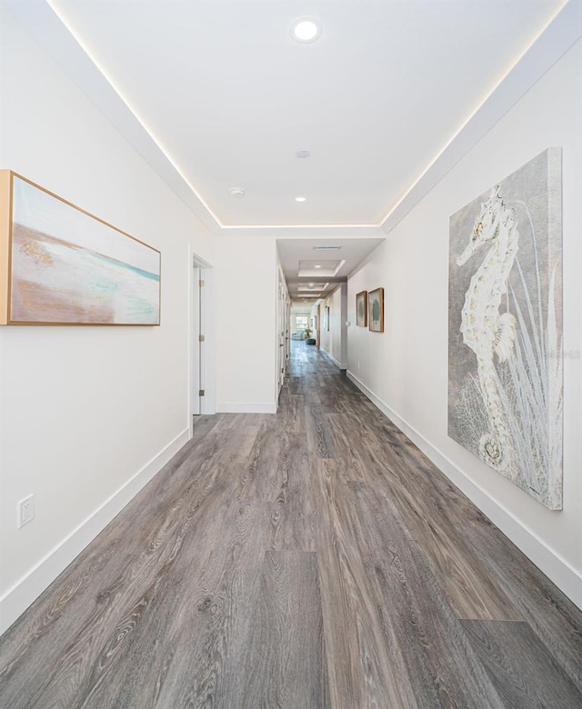 hall with dark wood-type flooring