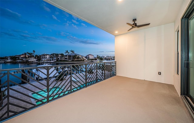 balcony at dusk with a water view