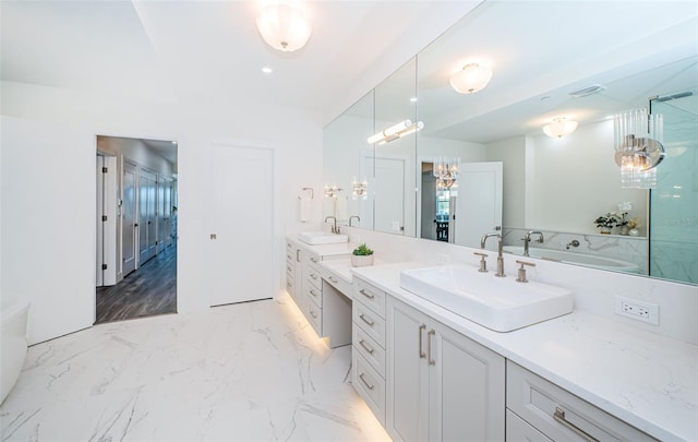 bathroom with hardwood / wood-style floors and vanity