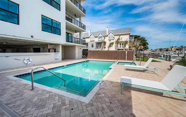 view of swimming pool featuring a patio