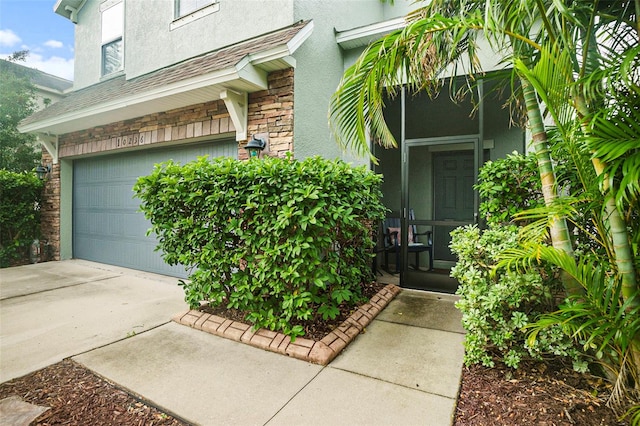 property entrance with a garage