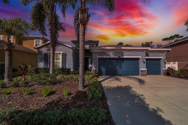 view of front of home with a garage