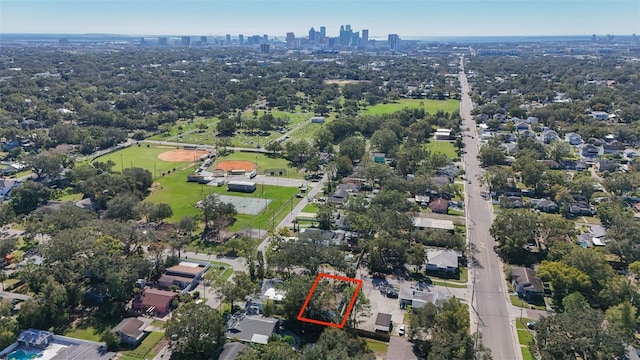 birds eye view of property featuring a view of city