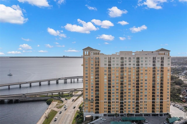 view of building exterior featuring a water view