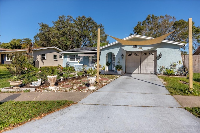 single story home featuring a garage