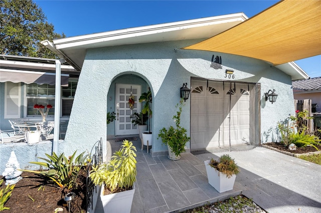 entrance to property with a garage