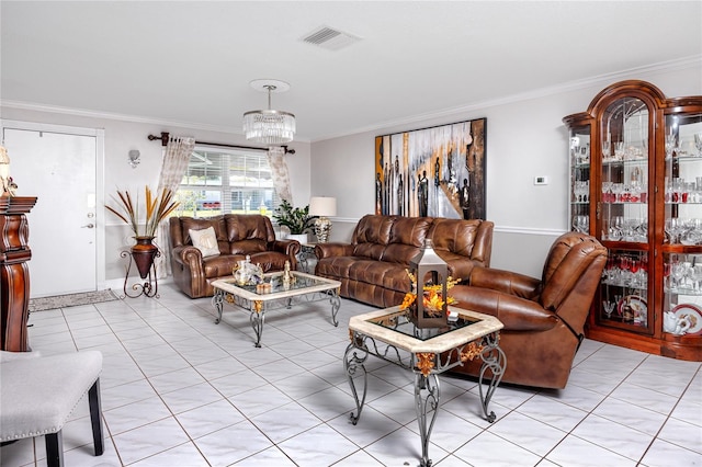 living room with an inviting chandelier, light tile patterned floors, and ornamental molding